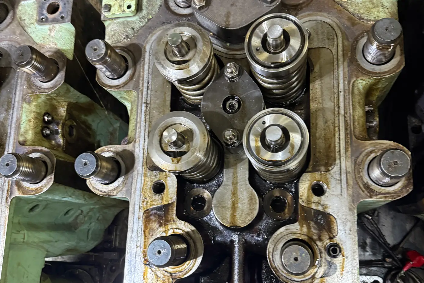 Cylinder head of a marine engine with valve gear exposed