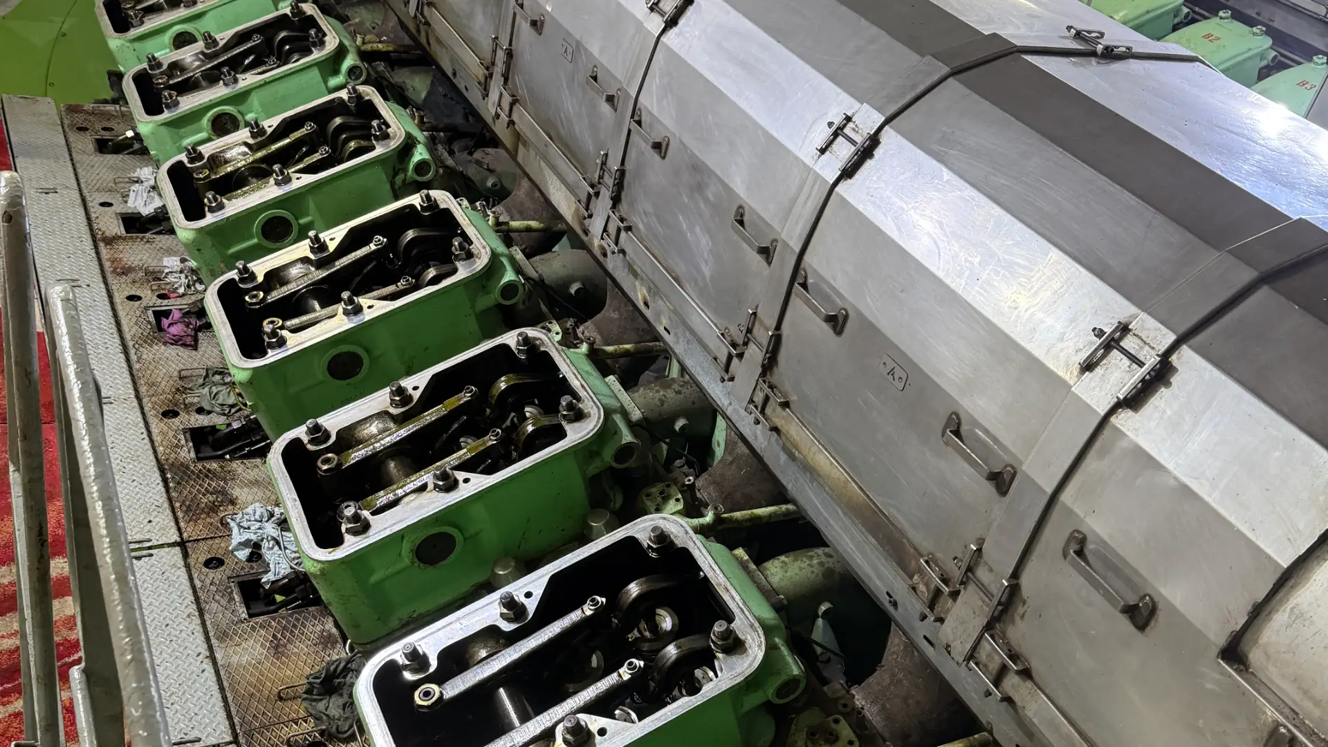 Marine main engine opened up along its length during an overhaul