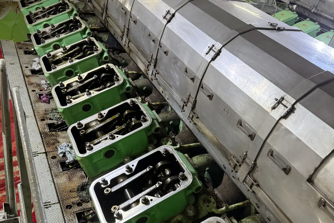 Cylinder covers removed along a marine main engine